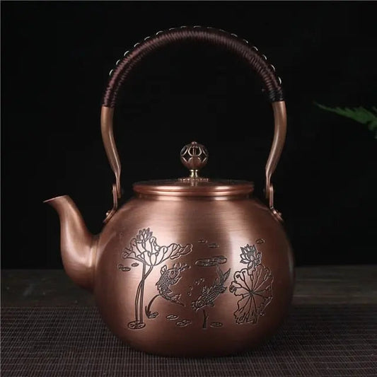 Traditional Chinese copper teapot 1.5L with hammered fish motif, round form