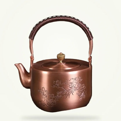 Chinese copper teapot with flower motif, 1.5L, full packshot on plain background
