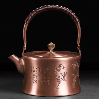 Front view of 1L Chinese copper teapot with traditional horse motif engraving