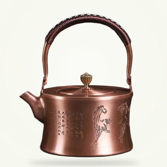 Chinese copper teapot with hand-engraved horse motif, 1L, packshot on plain background