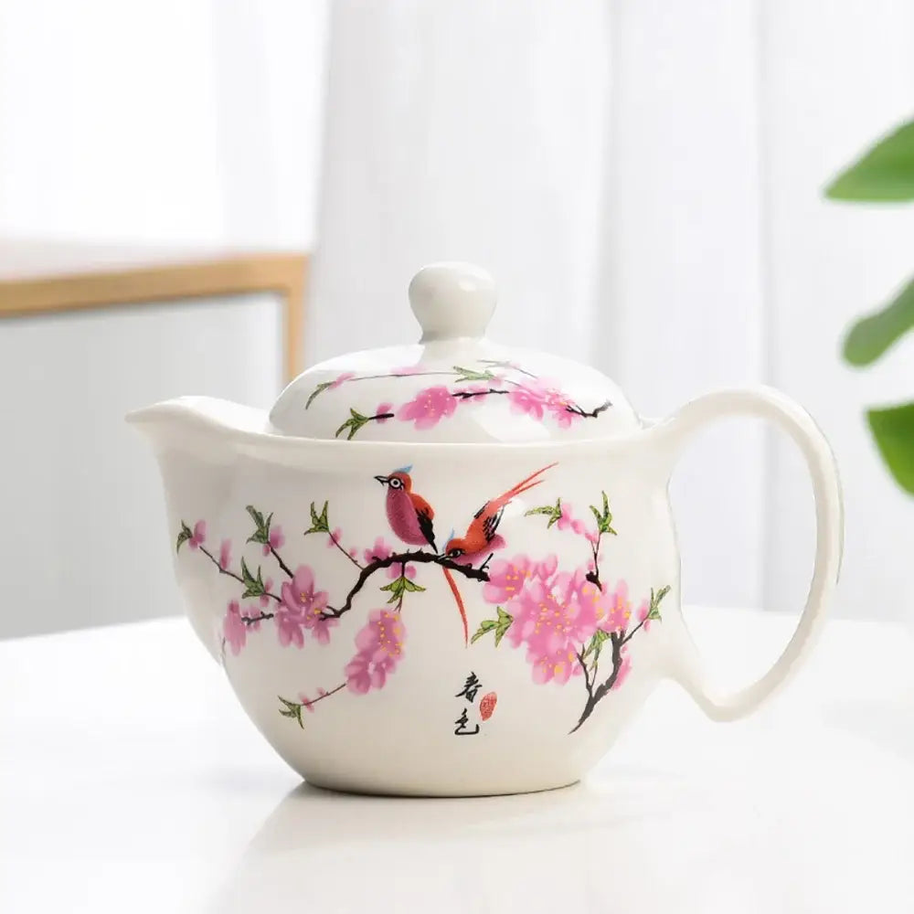Chinese porcelain teapot in rose, hand-painted floral design