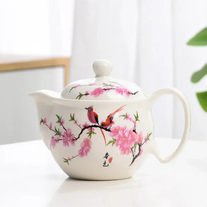 Chinese porcelain teapot in rose, hand-painted floral design