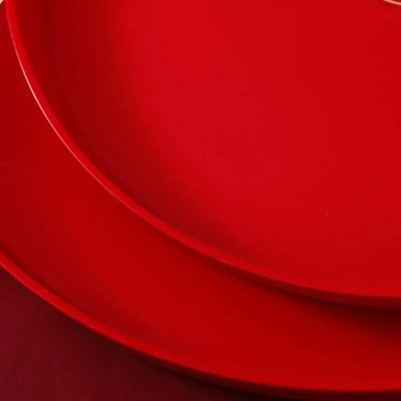 Round red tea tray with tea set