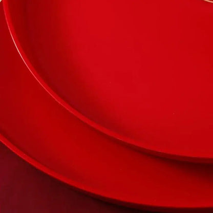 Round red tea tray with tea set