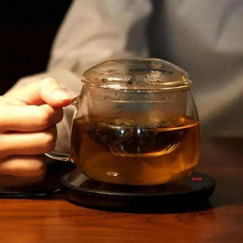 Mug warmer with hot tea cup