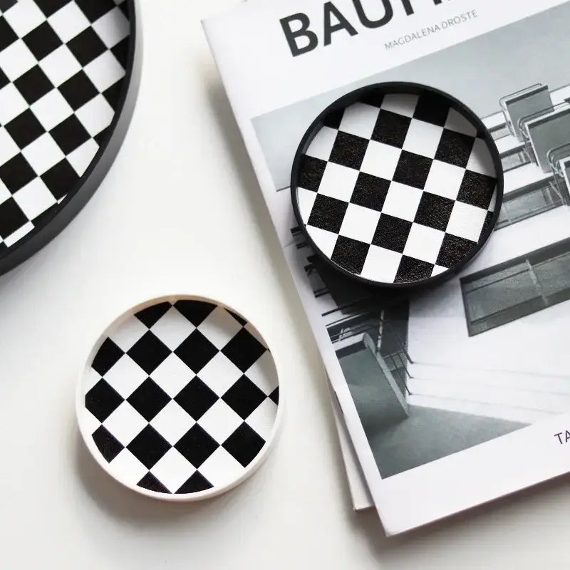 Black and white coffee saucer set on table