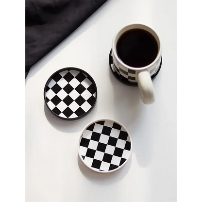 Coffee saucer with mug on wooden table