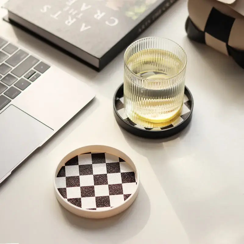 Checker pattern saucer under coffee cup