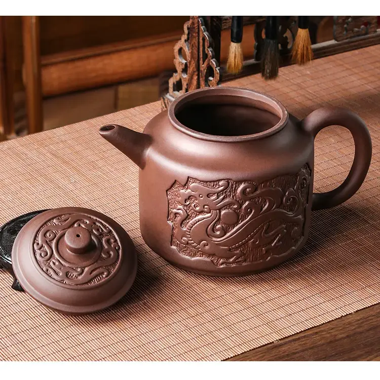 Ceramic teapot with infuser basket and lid