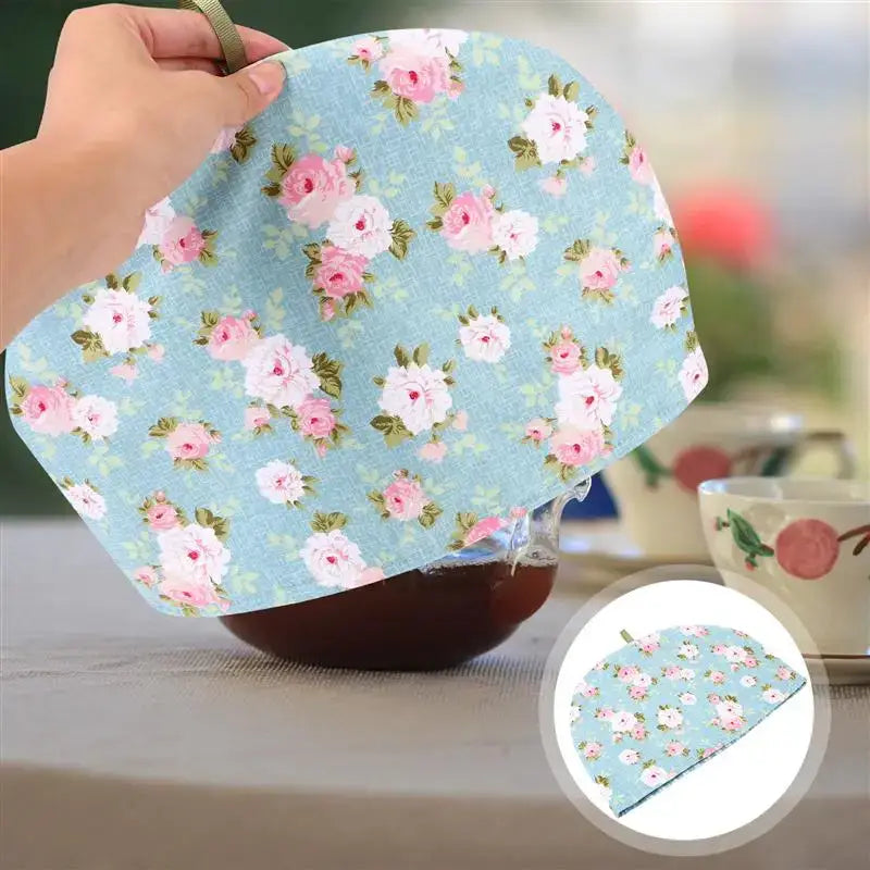 Beige cotton teapot cozy on neutral background, showing neutral warm tone