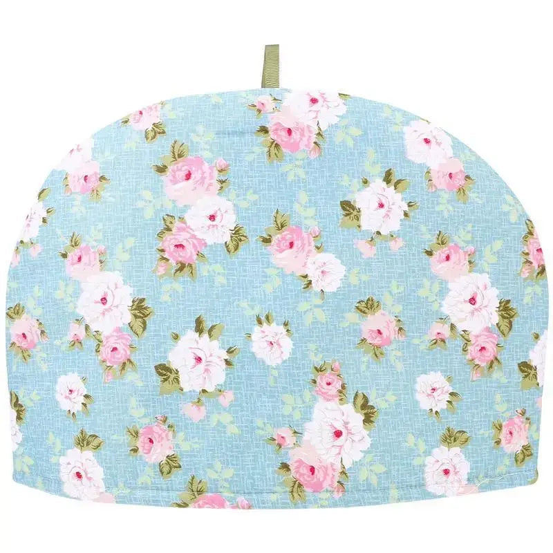 Blue cotton teapot cozy wrapped around a teapot ready to serve