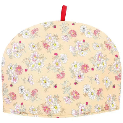 Beige cotton teapot cozy on teapot, styled on a wooden kitchen surface