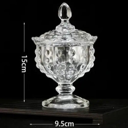 Coupe-shaped crystal glass tea jar with fitted lid, front view