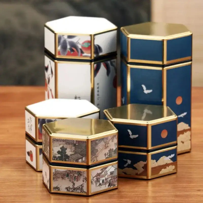 White tea storage tin with Chinese ink-and-wash floral painting on white background