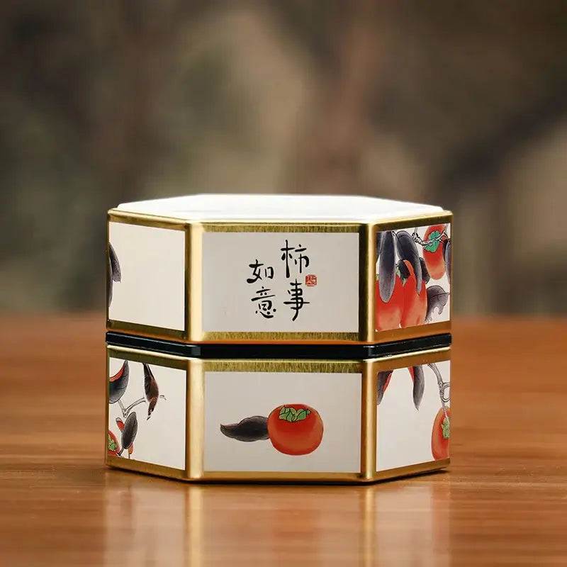 Small white tea tin with blue floral Chinese painting design