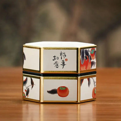 Small white tea tin with blue floral Chinese painting design