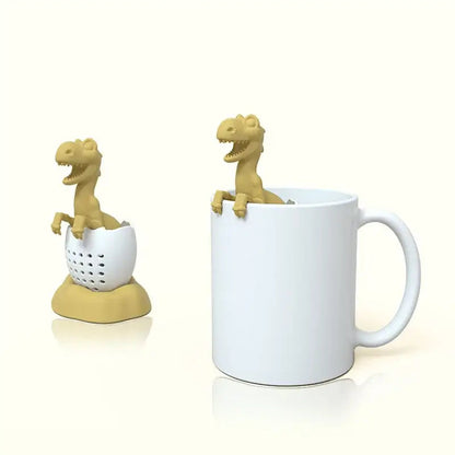 Dinosaur tea infuser on a saucer