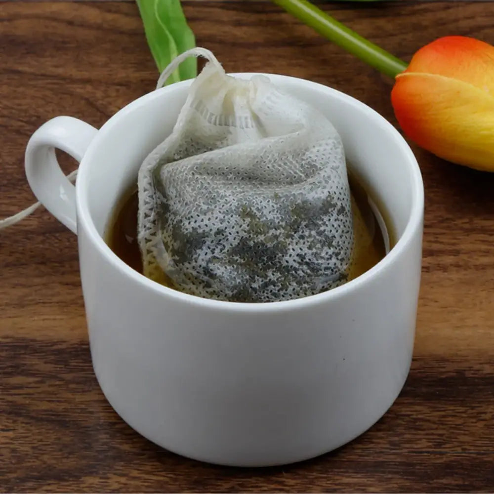 Open empty drawstring tea filter bag ready to fill with loose leaf tea