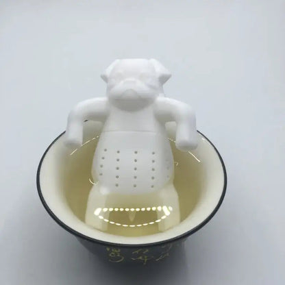 Dog tea infuser with tea leaves inside