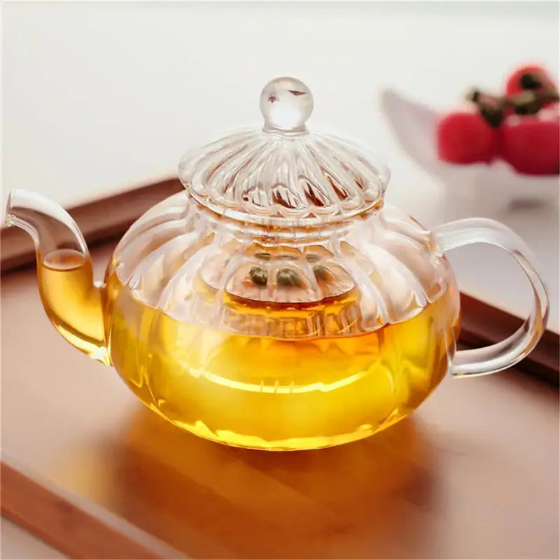 Double wall glass teapot with loose leaf infuser and six matching cups