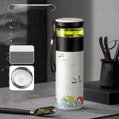 Open lid of 500ml insulated tea thermos showing removable stainless steel infuser basket inside