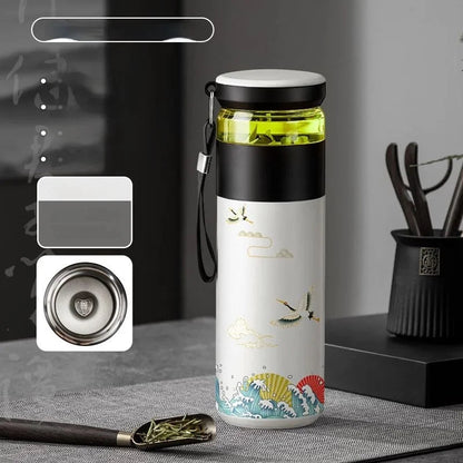 Pouring hot loose leaf tea from double wall insulated thermos bottle with infuser, 500ml