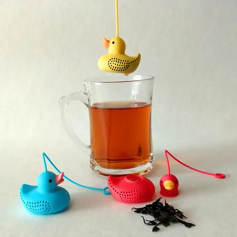 Yellow duck tea infuser floating in a cup of tea