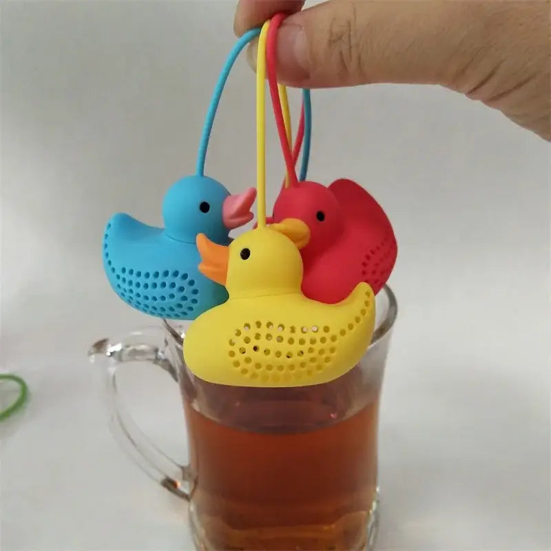 Close-up of duck tea infuser in a white mug