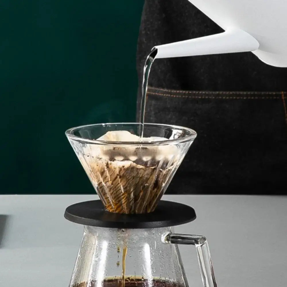 Electric teapot touch controls and stainless steel body, front view