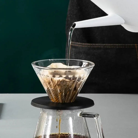 Electric teapot touch controls and stainless steel body, front view