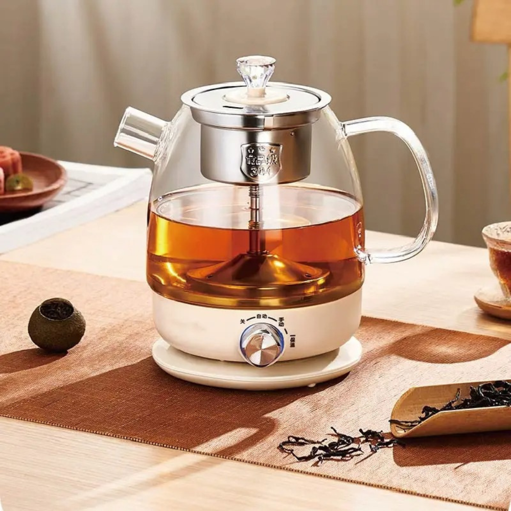 1-liter electric glass teapot on cordless keep-warm base, side angle