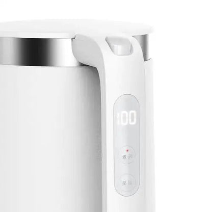 Electric kettle handle and cool-touch exterior
