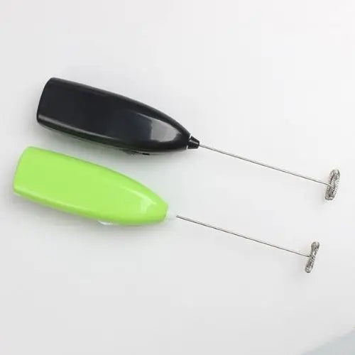 Electric matcha whisk handle showing battery compartment detail