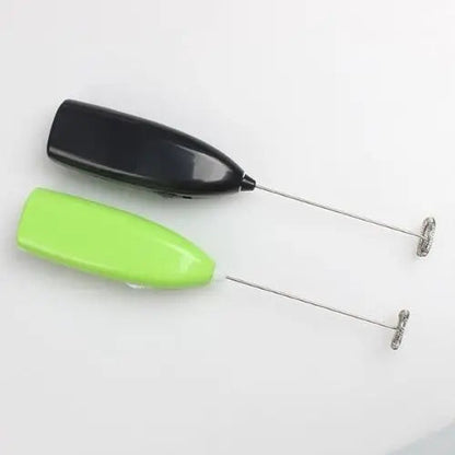Electric matcha whisk handle showing battery compartment detail