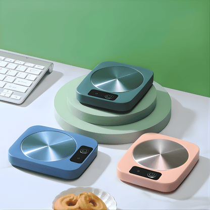 Electric mug warmer heating plate in green color, top view