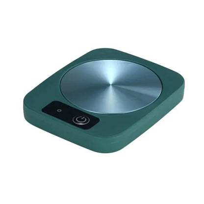 Electric mug warmer keeping ceramic tea mug warm at 55 degrees Celsius