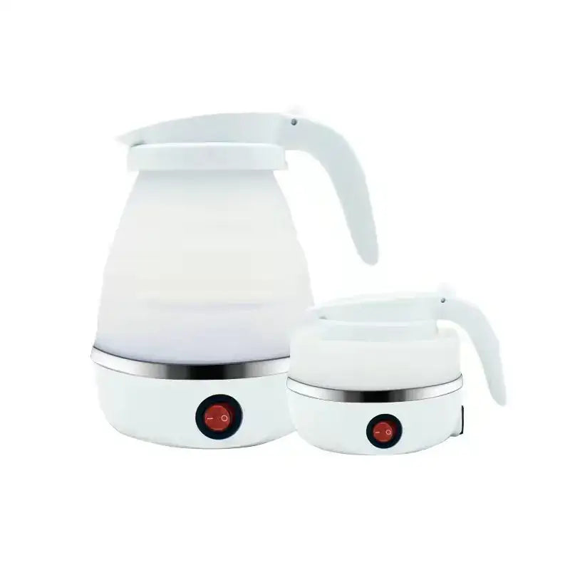 Compact 0.6L electric kettle on kitchen counter beside a teapot