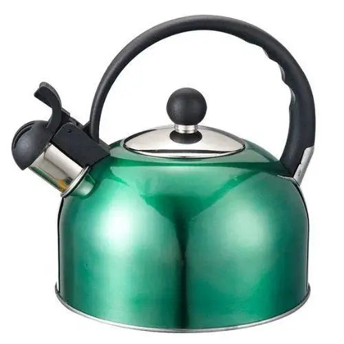 Emerald green vintage whistling kettle sitting on a gas stovetop burner