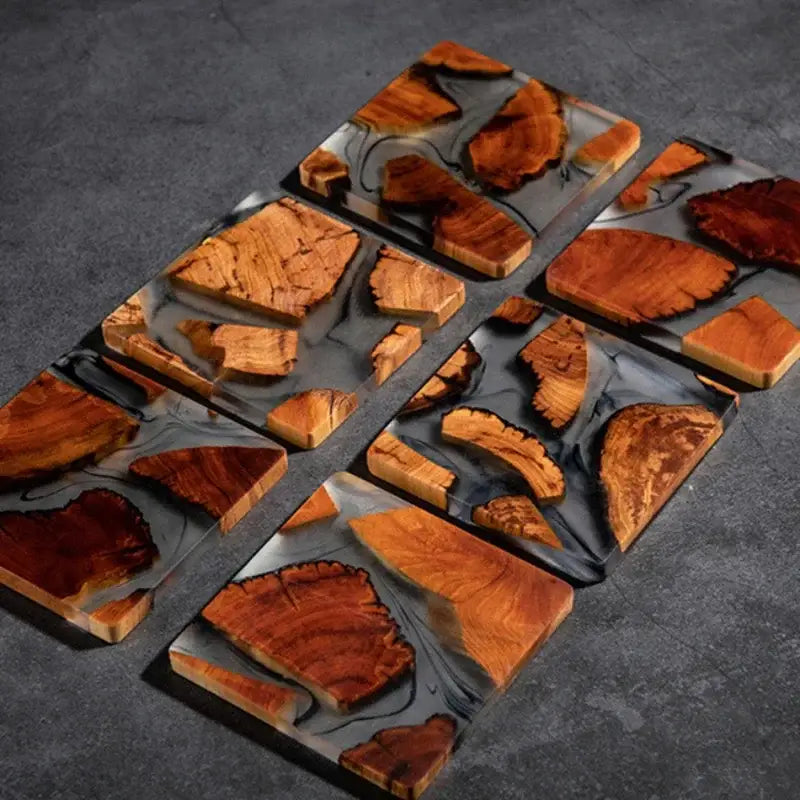 Close up of a wooden resin coaster with ink swirls