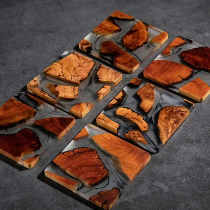 Close up of a wooden resin coaster with ink swirls