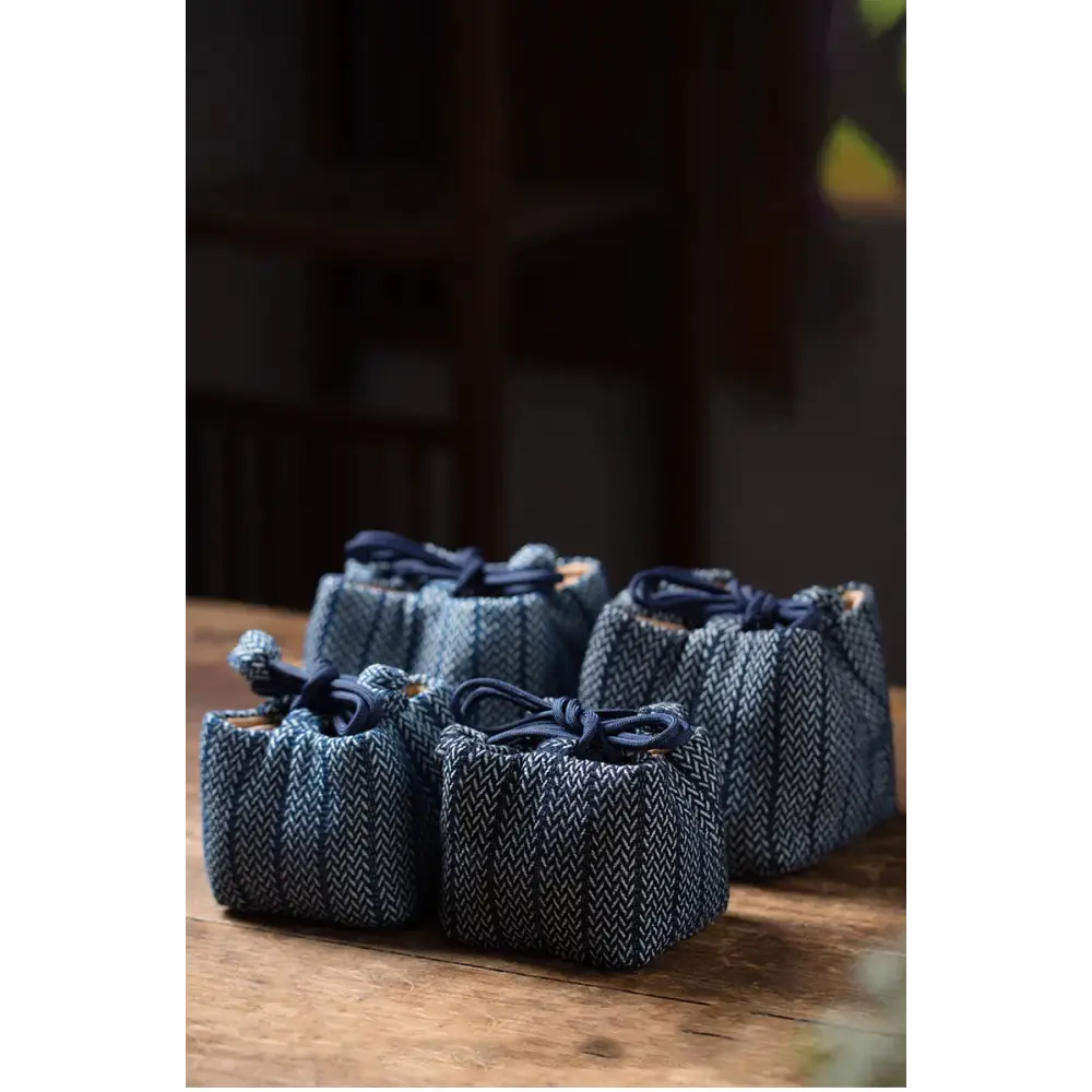 Fabric teapot cozy with drawstring closure