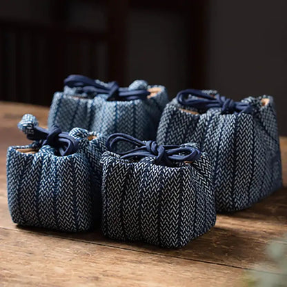 Navy cotton-linen teapot cozy with drawstring, side view