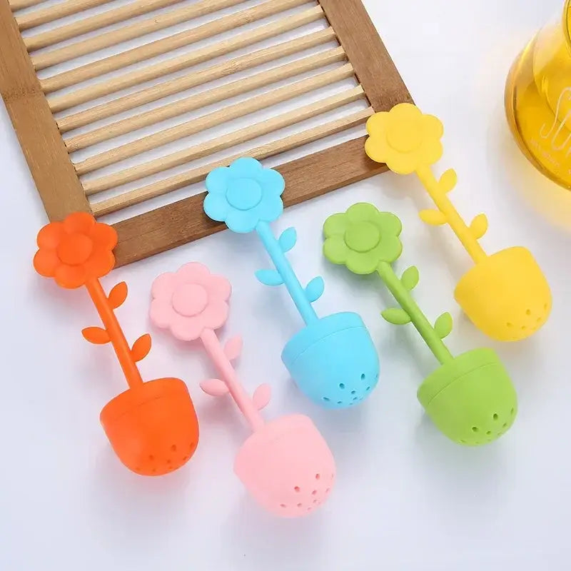 Close-up of flower tea infuser with tea leaves