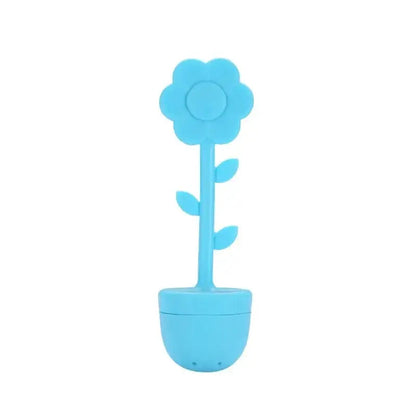 Blue flower tea infuser in a glass teapot