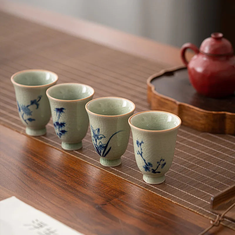 Hand-painted chrysanthemum porcelain tea cup from the Four Gentlemen set close-up