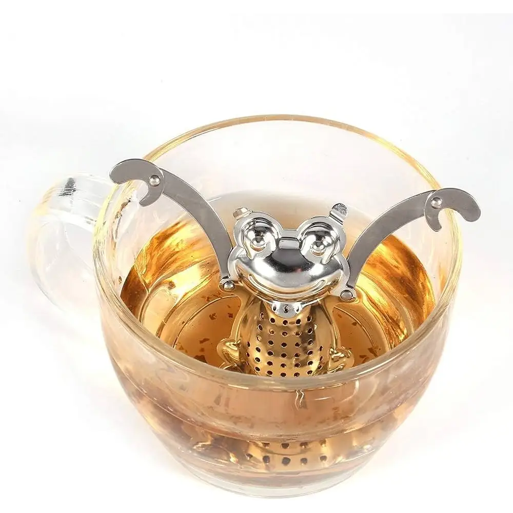 Cute frog tea infuser with steam from cup