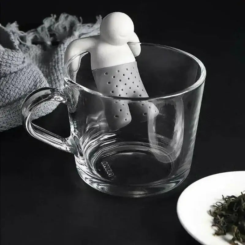 Silicone tea infuser shaped like a man with loose leaf tea
