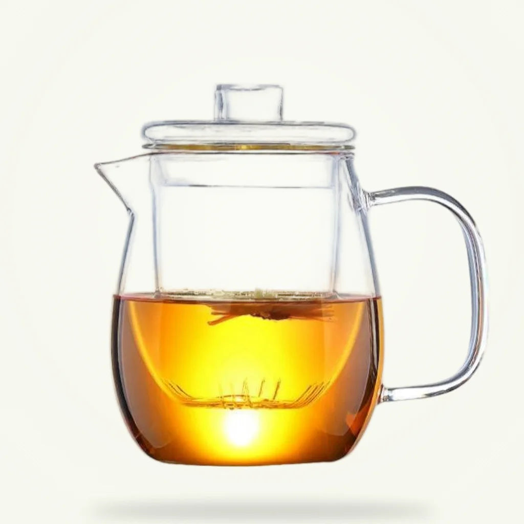 Glass flowering tea teapot 600ml and 1200ml Scandinavian style on plain background