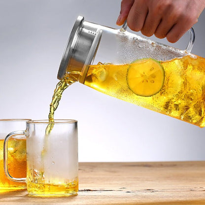 Cold brew glass pitcher filled with iced tea and lemon slices, fridge-ready