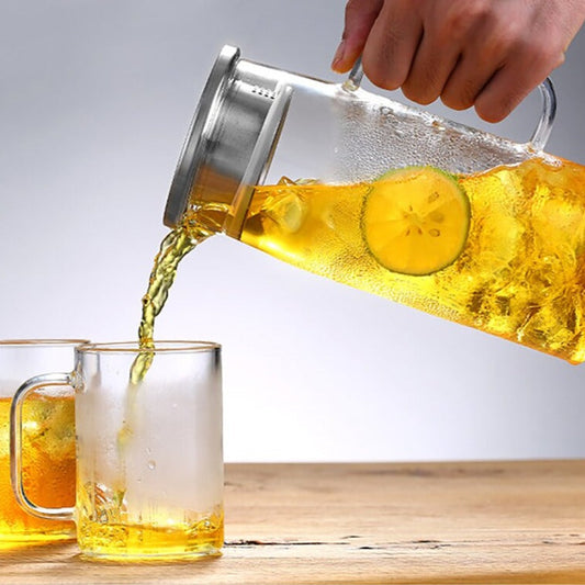 Cold brew glass pitcher filled with iced tea and lemon slices, fridge-ready